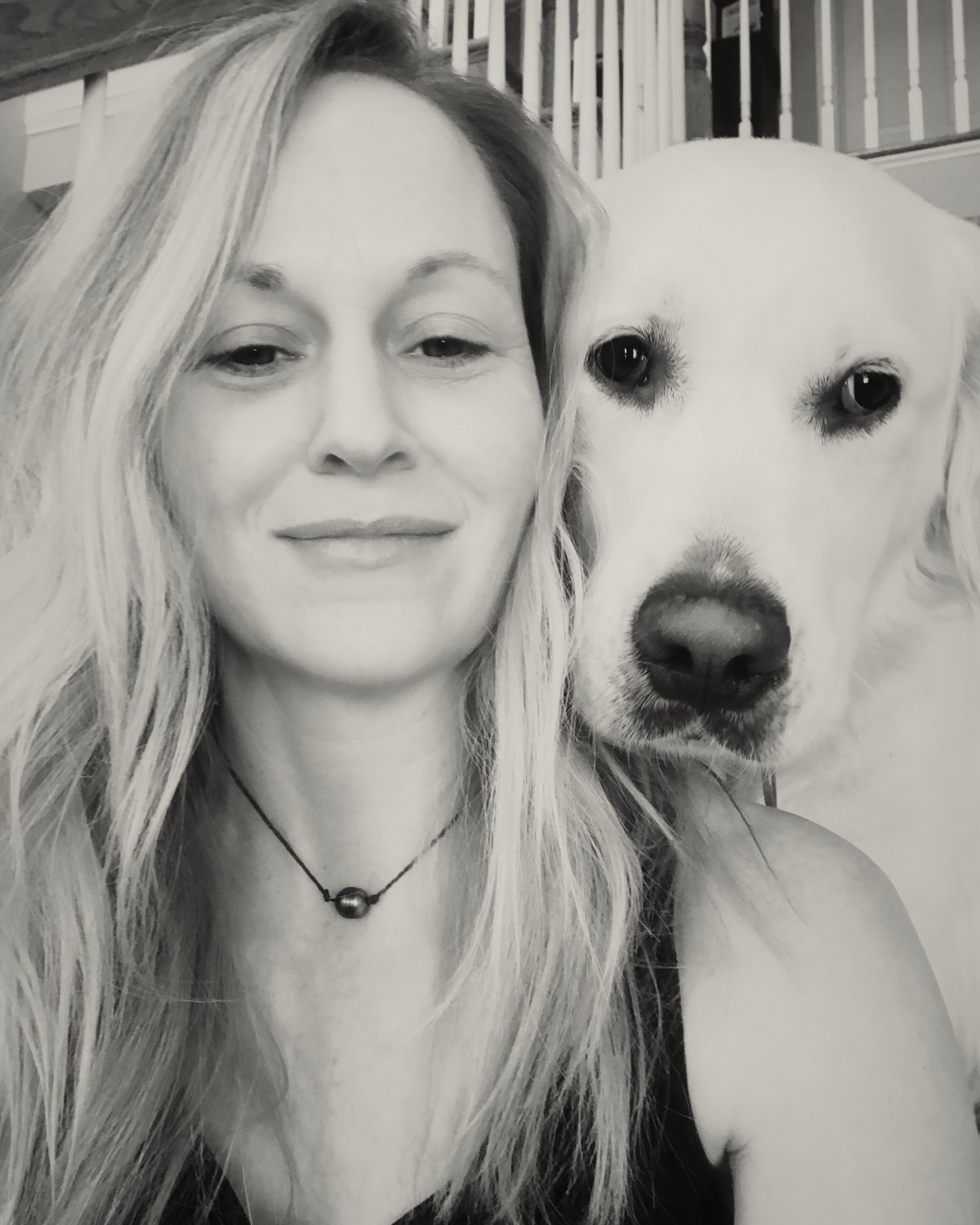 Kelly with Sawyer resting his head on her shoulder